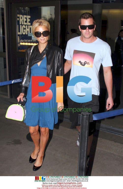 Paris Hilton and Doug Reinhardt Arrive at LAX
