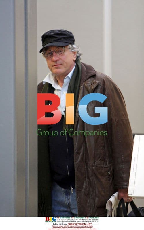 Robert De Niro and wife Grace Hightower at airport