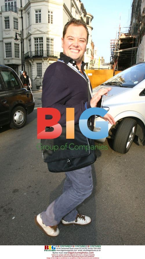 Alan Carr looking cheerful in London