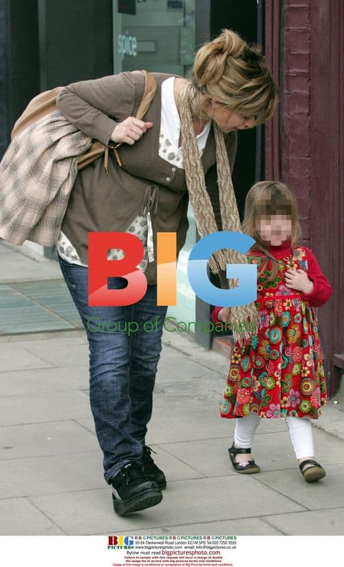 Kate Garraway with husband and daughter in Primrose Hill