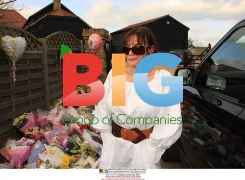 Jackiey Budden receives flowers on day Jade Goody dies