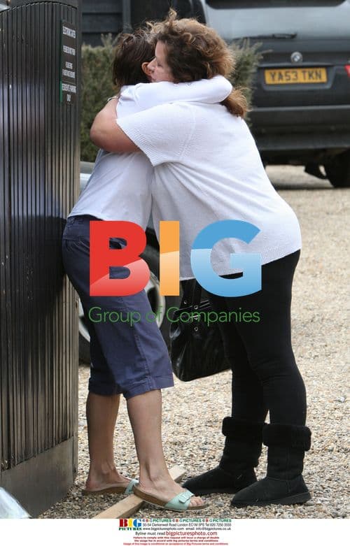 Mourners Comfort Jackie Budden After Daughter's Death