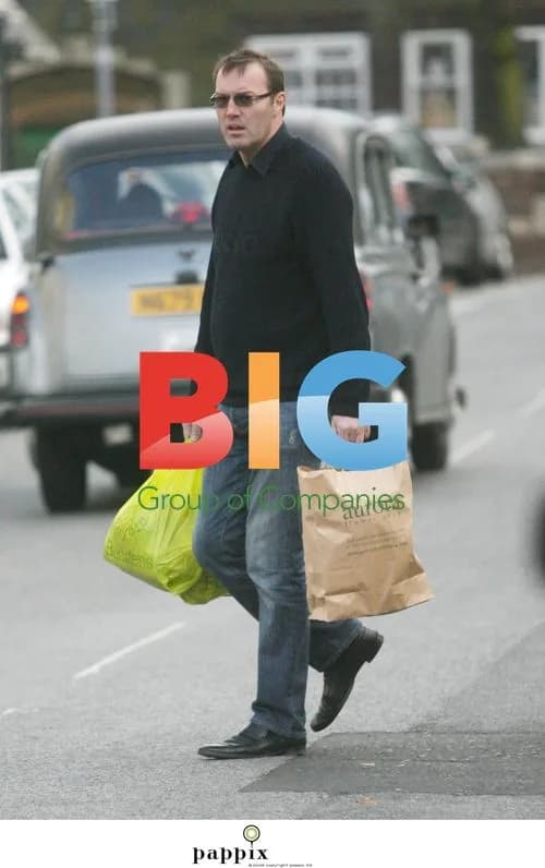 Diana biographer Andrew Morton spotted out walking