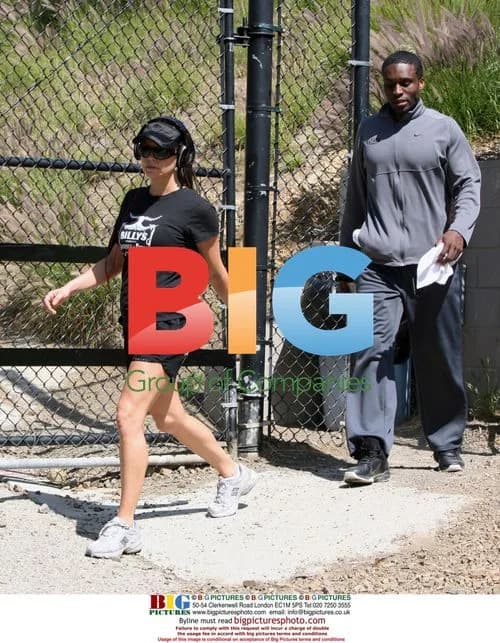 Singer Fergie works out with trainer