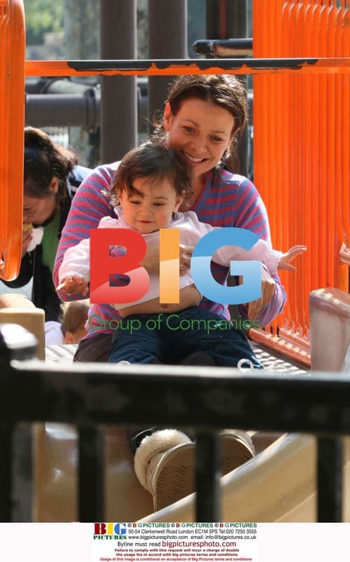 Justine Bateman playing with son in park