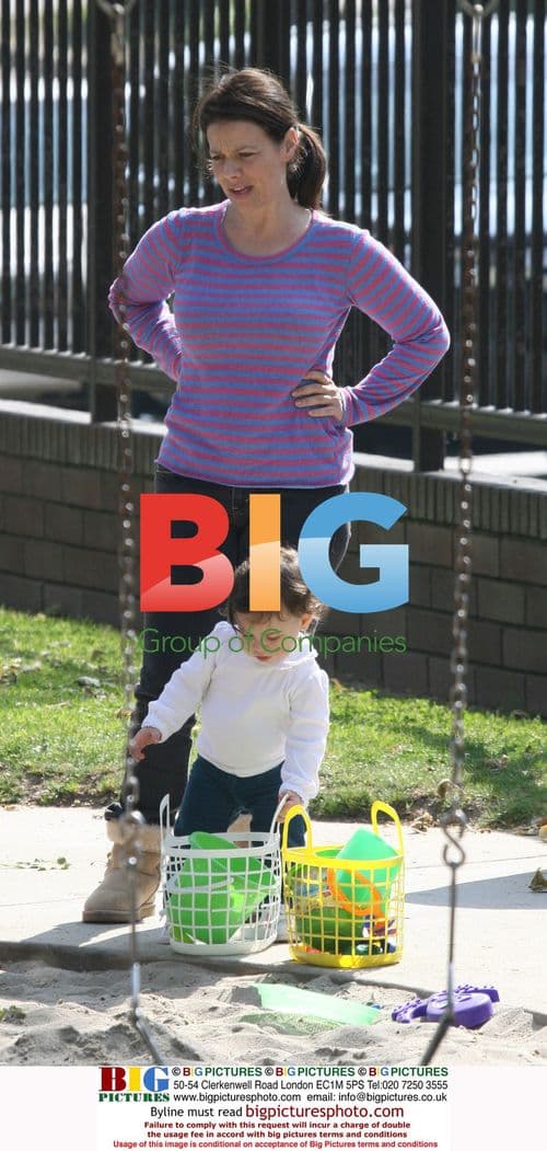 Justine Bateman and son playing in park