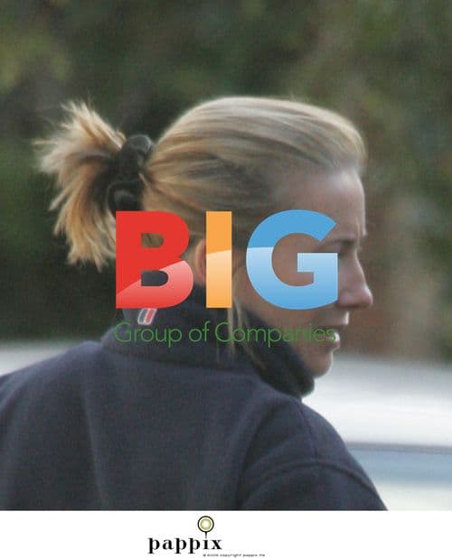 Emma Thompson chats with friend in London