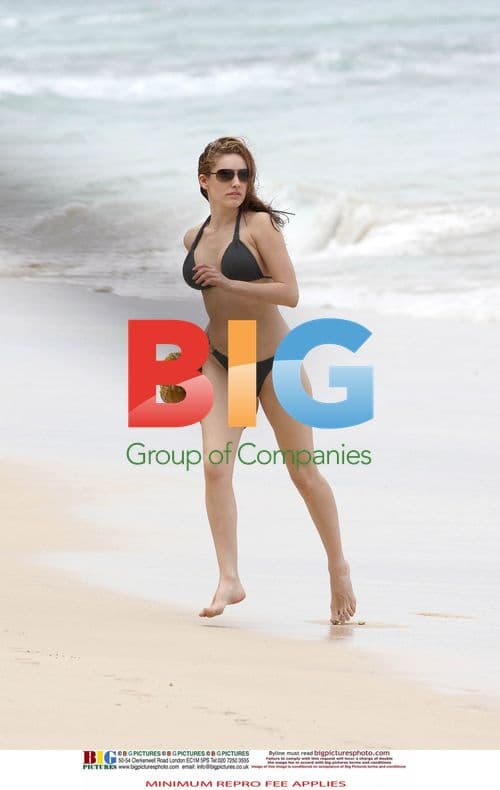 Kelly Brook in Black Bikini on Caribbean Holiday