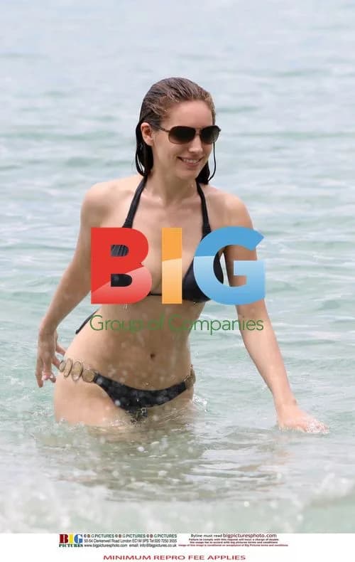 Kelly Brook in Black Bikini on Caribbean Holiday