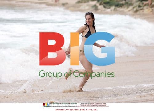 Kelly Brook in Black Bikini on Caribbean Vacation