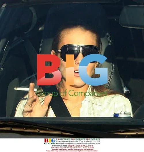 Lindsay Lohan and Samantha Ronson smoking after dinner