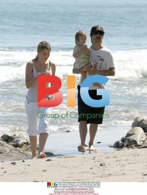 Anthony Kiedis with baby and friends in Malibu
