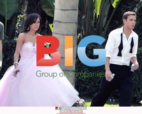 Actors Jessica Stroup and Dustin Milligan on 90210 set