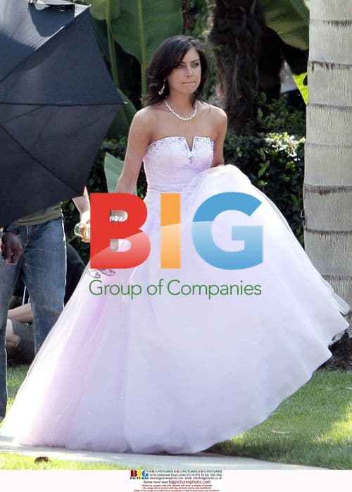 Actors Jessica Stroup and Dustin Milligan on 90210 set