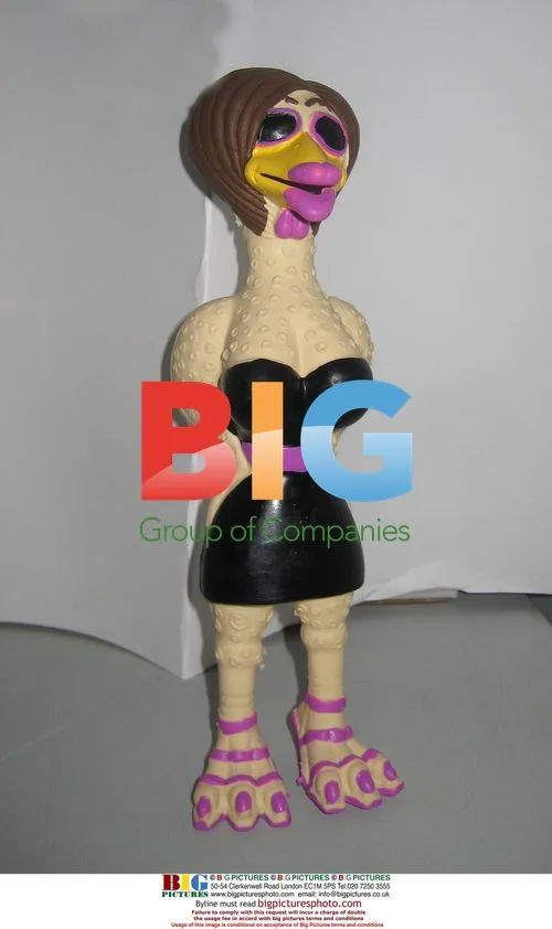 Dog chews on Beckham-inspired rubber chickens