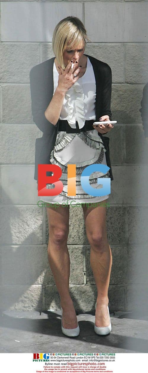 Jenni Falconer takes a cigarette break