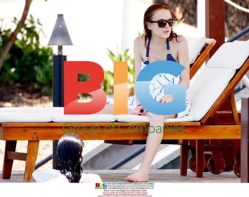 Lindsay Lohan Relaxes at Maui Resort