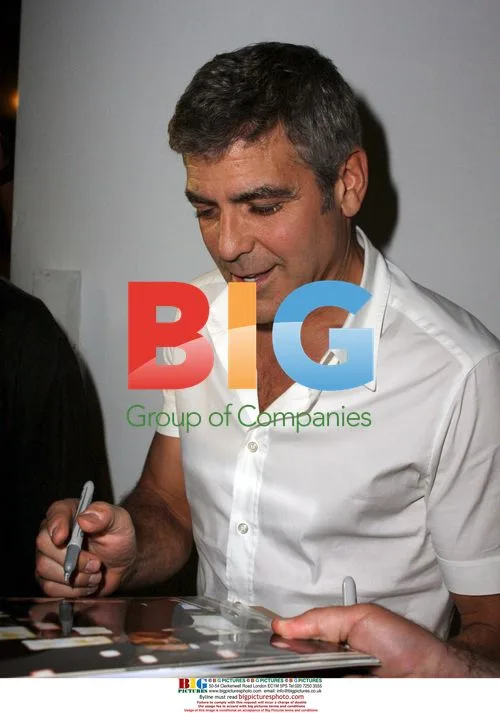 George Clooney signs autographs in South Beach