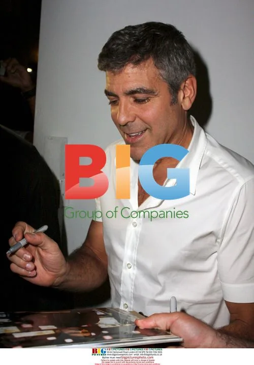 George Clooney signs autographs in South Beach