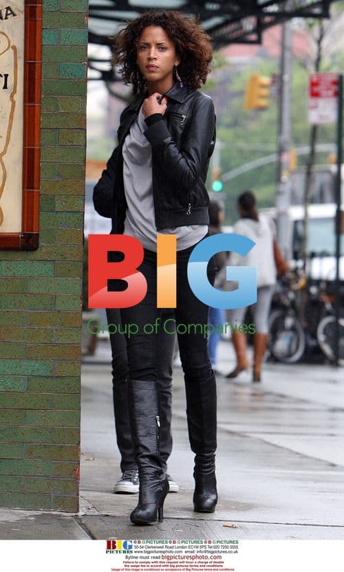 Noemie Lenoir steps out for a cigarette in NYC