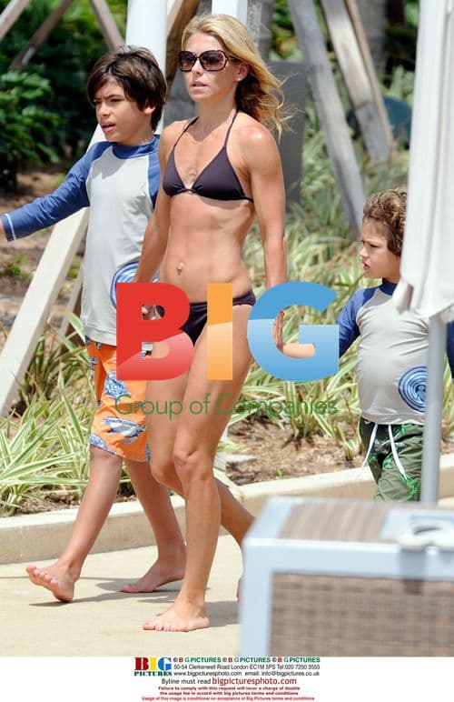 Kelly Ripa Enjoys Family Time by Pool in Miami