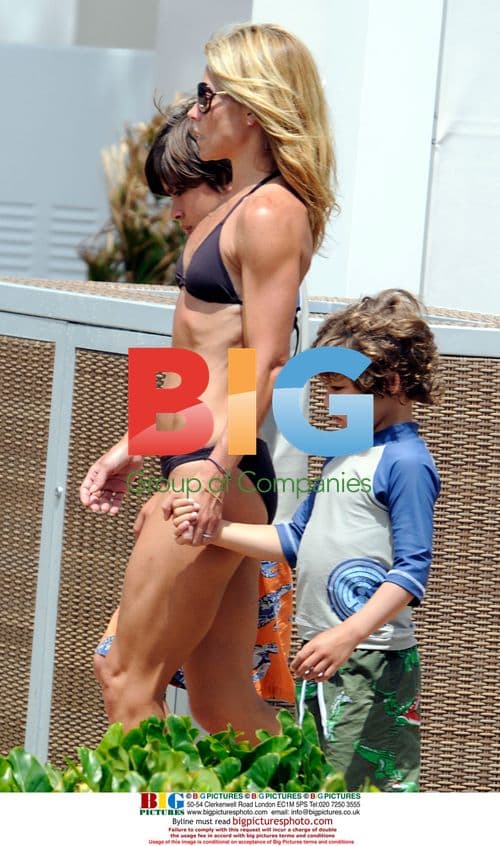 Kelly Ripa with family poolside in Miami