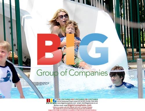 Kelly Ripa Enjoys Pool Day with Family in Miami