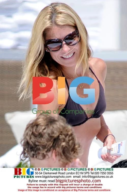 Kelly Ripa and family by pool in Miami