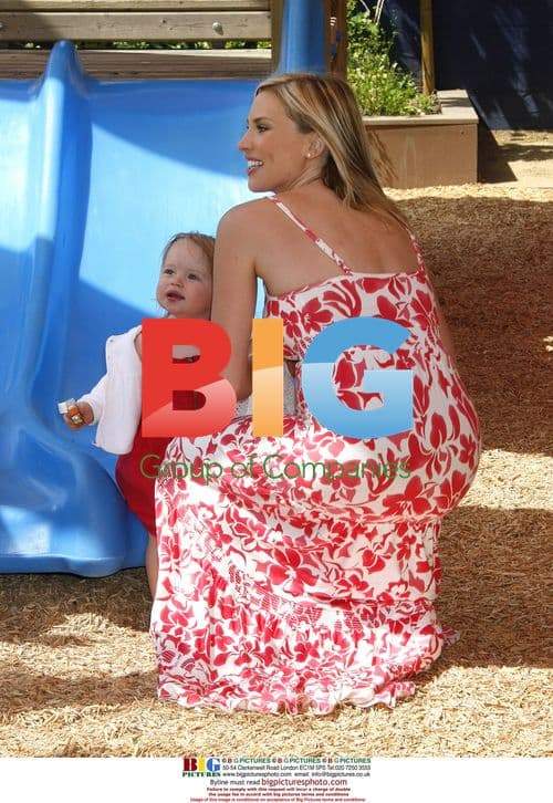 Jason Priestley with pregnant wife and daughter