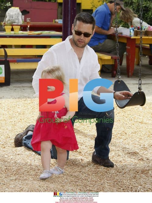 Jason Priestley with pregnant wife and daughter