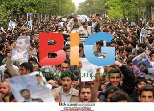 Iran's President Mahmoud Ahmadinejad greets supporters