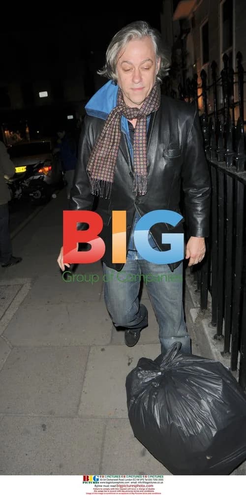 Bob Geldof tripping on bin bag in London