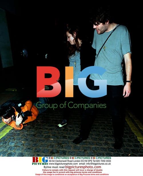 Klaxons' Jamie Reynolds laughs with photographer