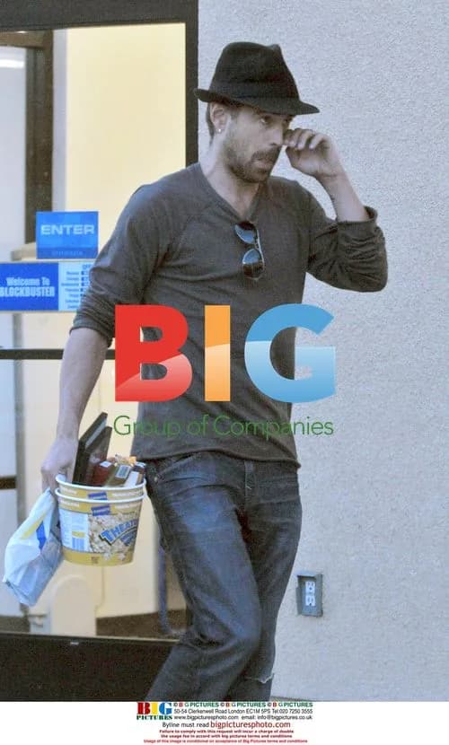 Colin Farrell watches movie at home
