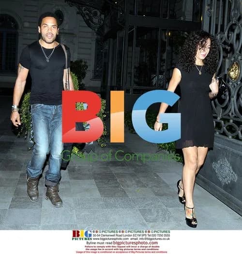 Lenny Kravitz and Girlfriend Leave Hotel