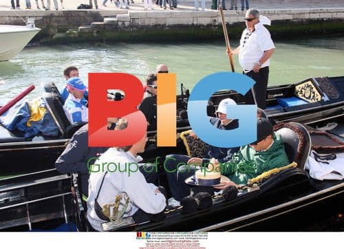 Lance Armstrong and cyclists take gondola ride in Venice