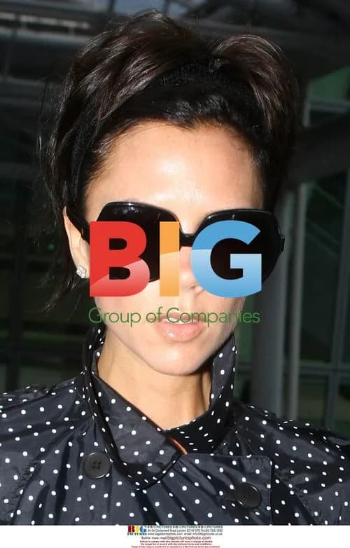 Victoria Beckham Arrives at Heathrow Airport