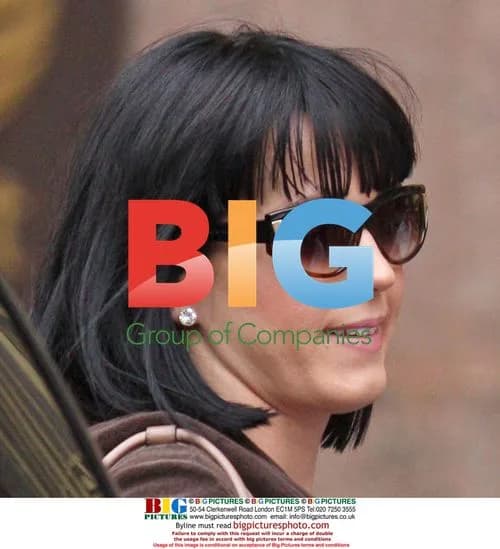 Katy Perry looks sombre leaving NYC radio station