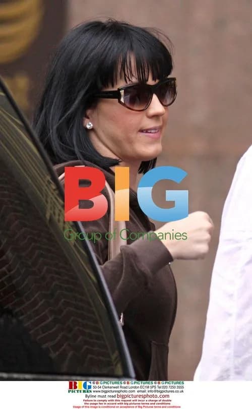 Katy Perry looks sombre leaving NYC radio station