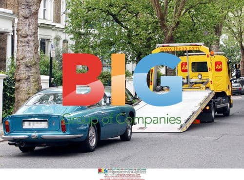 David Walliams' broken down Aston Martin towed