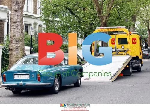 David Walliams' broken down Aston Martin towed