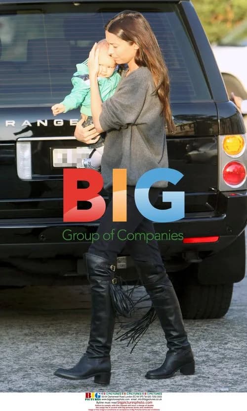 Erica Packer shields baby Indigo in Sydney