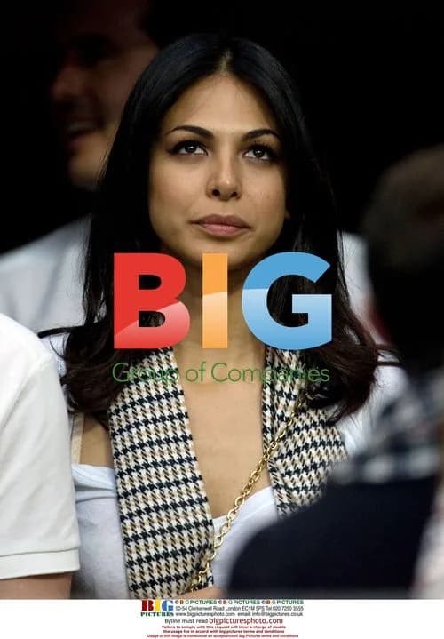 Caroline Celico watches husband's team game