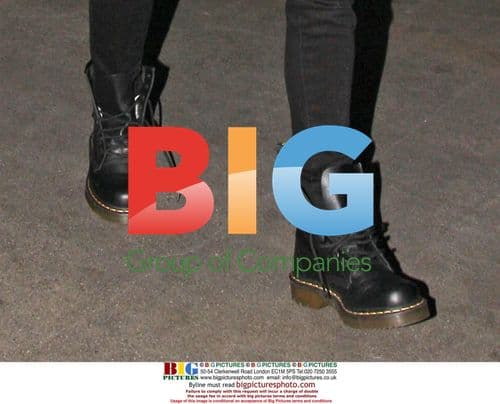 Fergie Departs LAX in Sunglasses