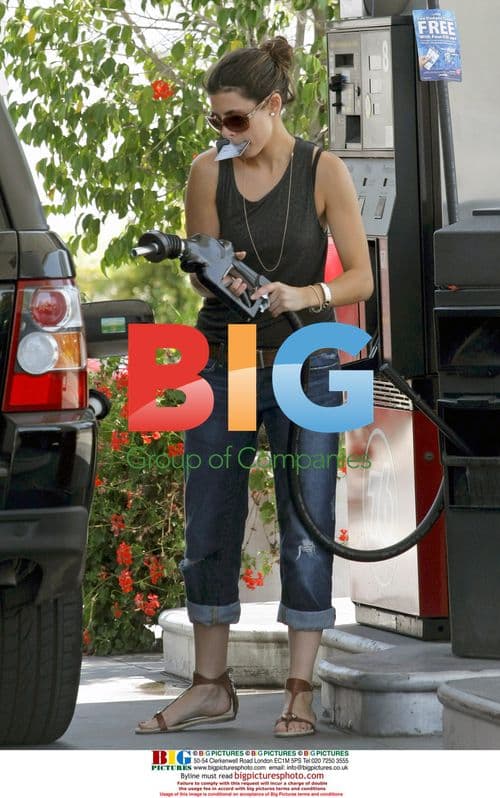 Jamie-Lynn Sigler Pumps Gas with Credit Card in Mouth