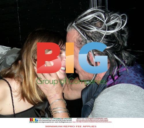Mickey Rourke and Eugenia Kissing