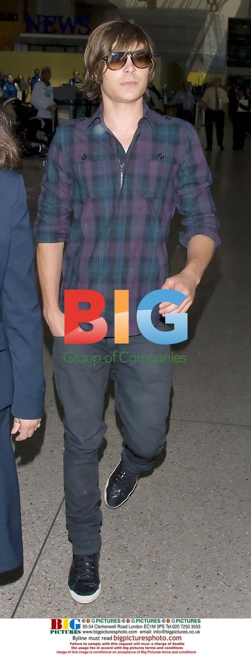 Zac Efron departs LAX