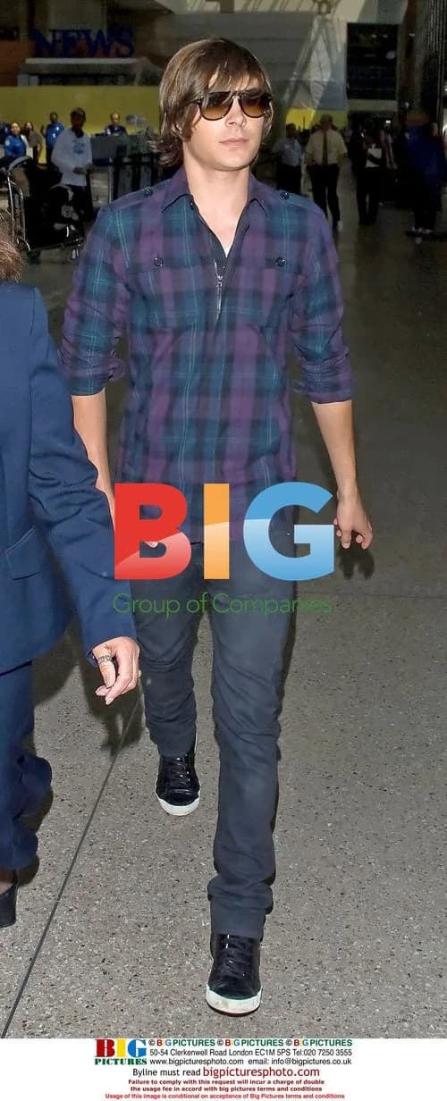 Zac Efron departs LAX