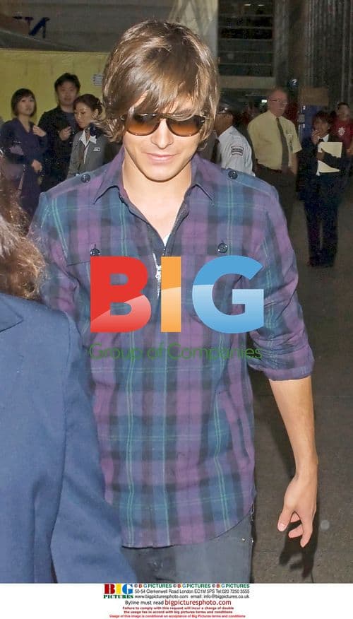 Zac Efron departs LAX in Los Angeles