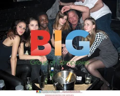 Mickey Rourke kissing model Eugenia